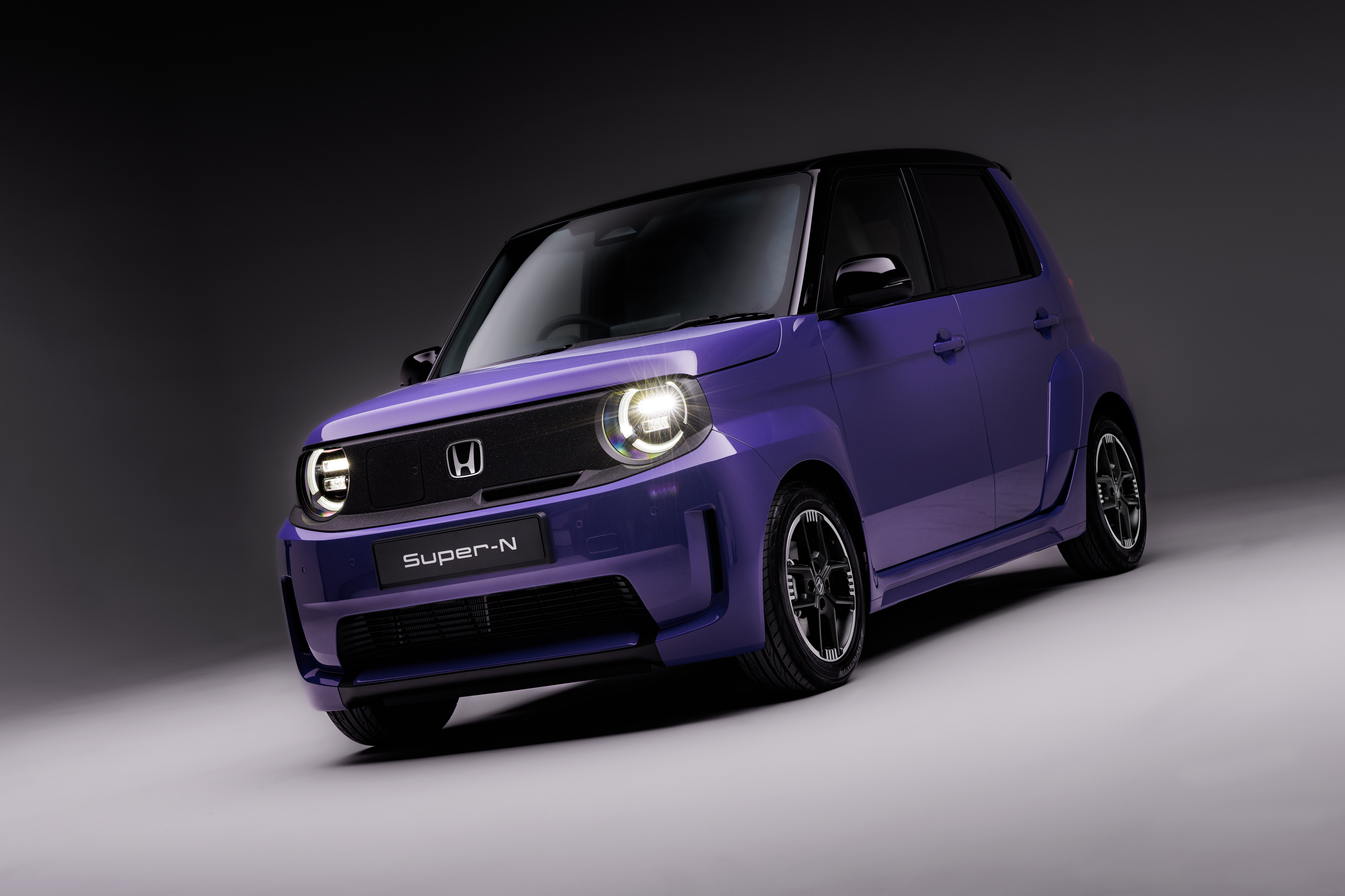 Honda Super-N front 3/4 facing in purple.